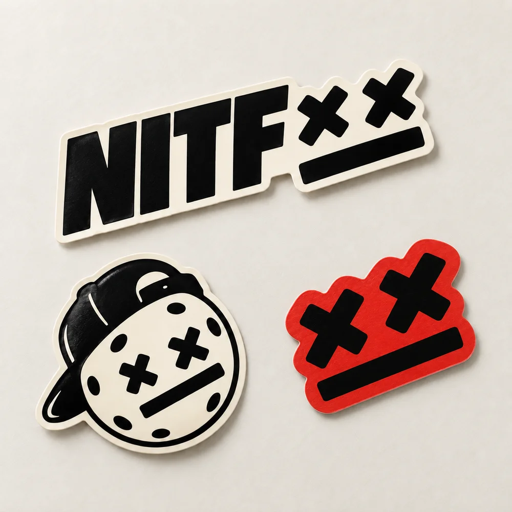 Concept preview of NITF logo, pickleball-head, and orange face stickers